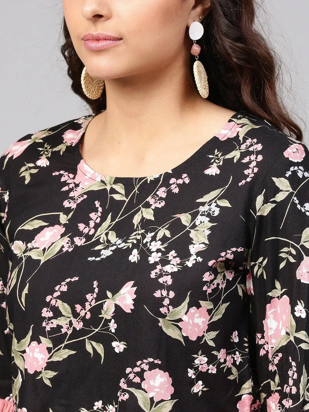 Solid Black Based Multi Floral Prints With A Round Neck And Flared Sleeves